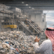 A man observes a waste facility