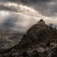 A stormy valley under watchful eyes
