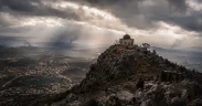 A stormy valley under watchful eyes