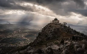 A stormy valley under watchful eyes