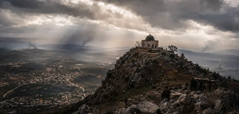 A stormy valley under watchful eyes