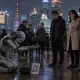 Robot at dusk in neon city